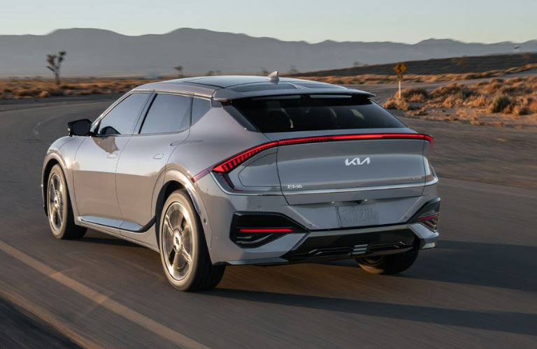 rear view of the 2025 Kia EV6 driving away on the road
